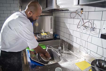 Chef washing up